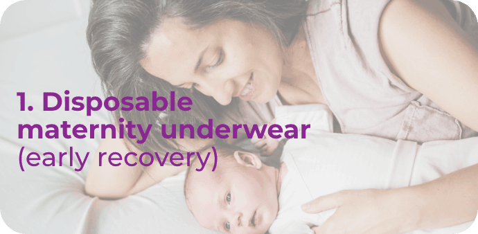 mother smiling holding baby